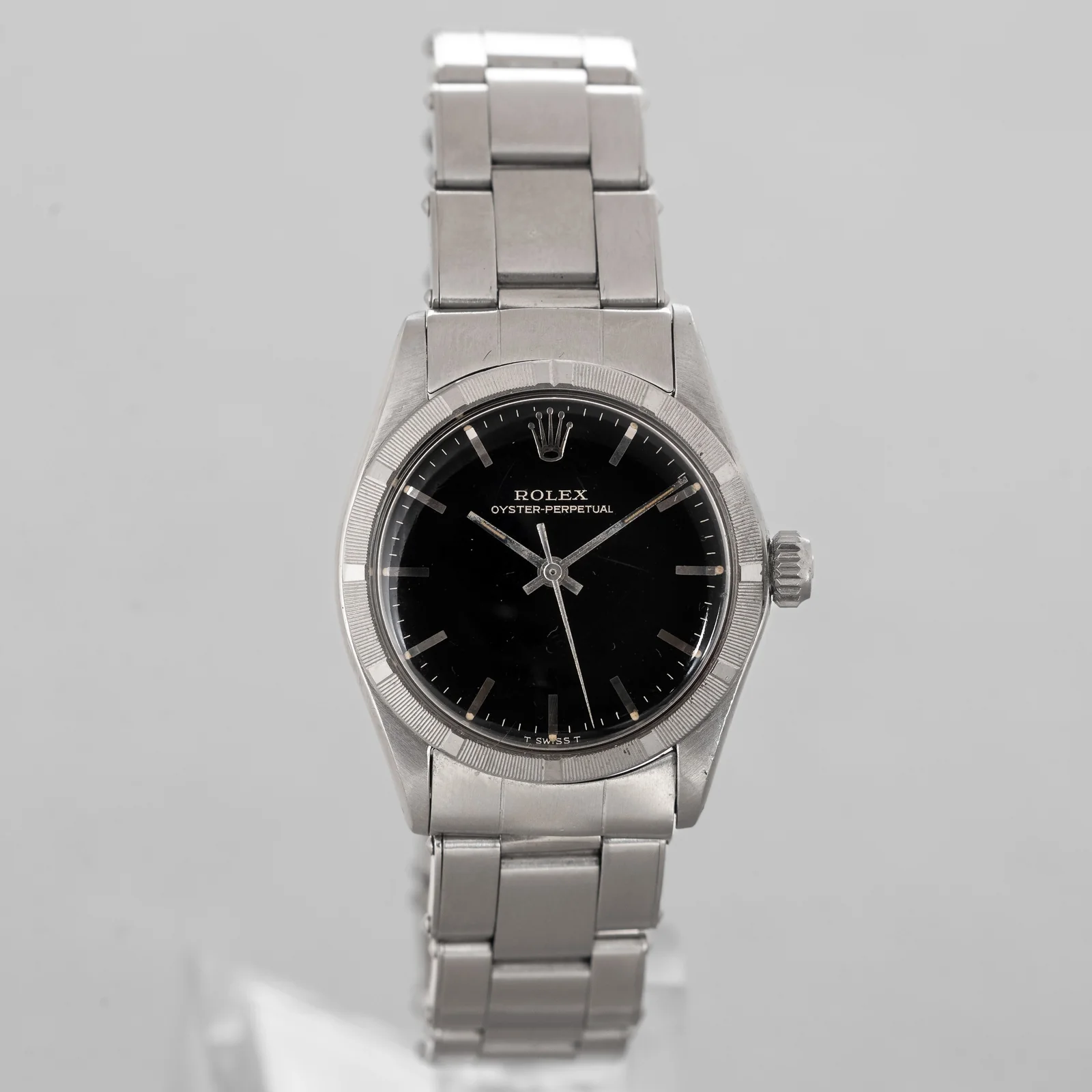 Steel Rolex Oyster Perpetual 6549 with a black dial and riveted Oyster bracelet