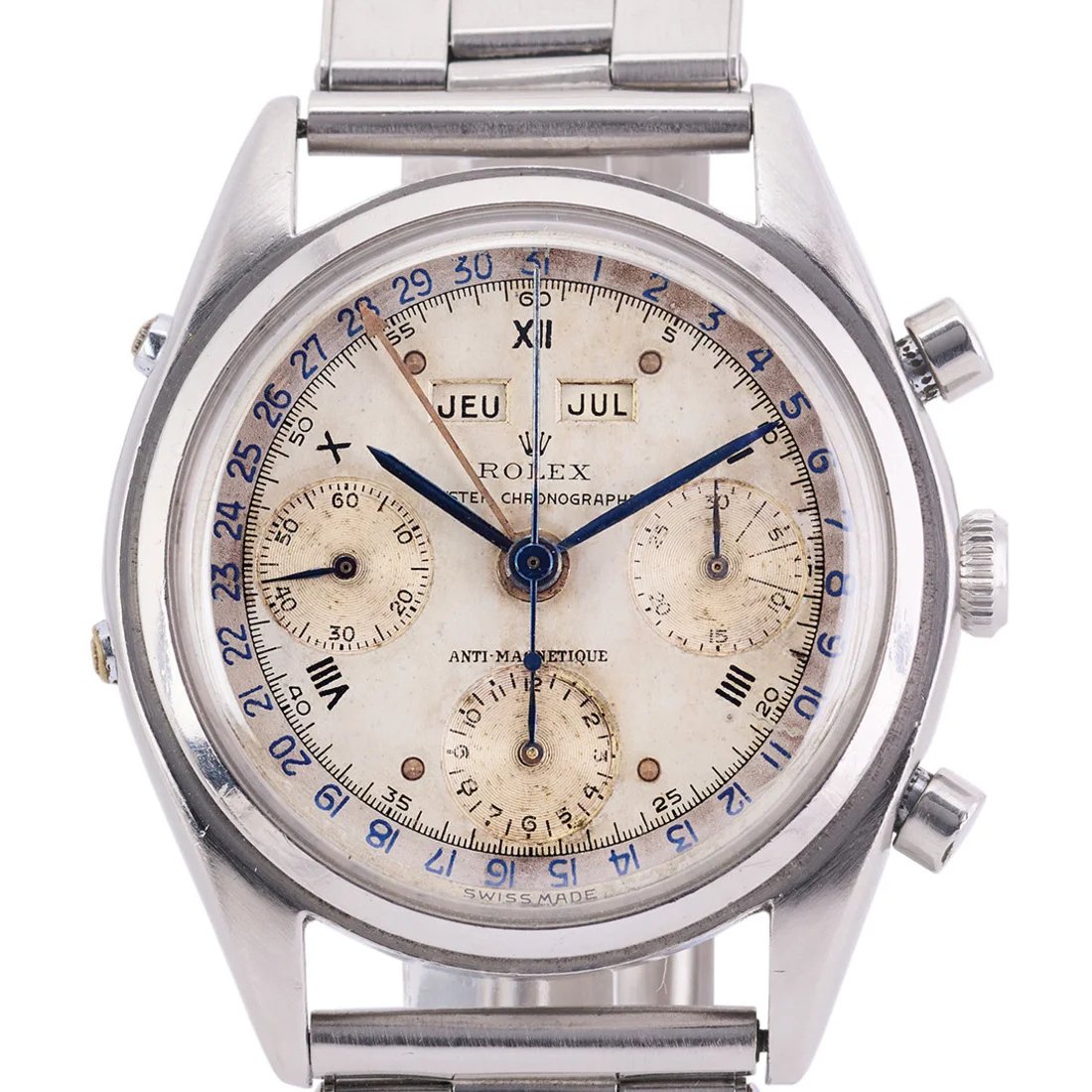 Close view of the silvered calendar and chronograph dial on Rolex ref. 4767 case 584351