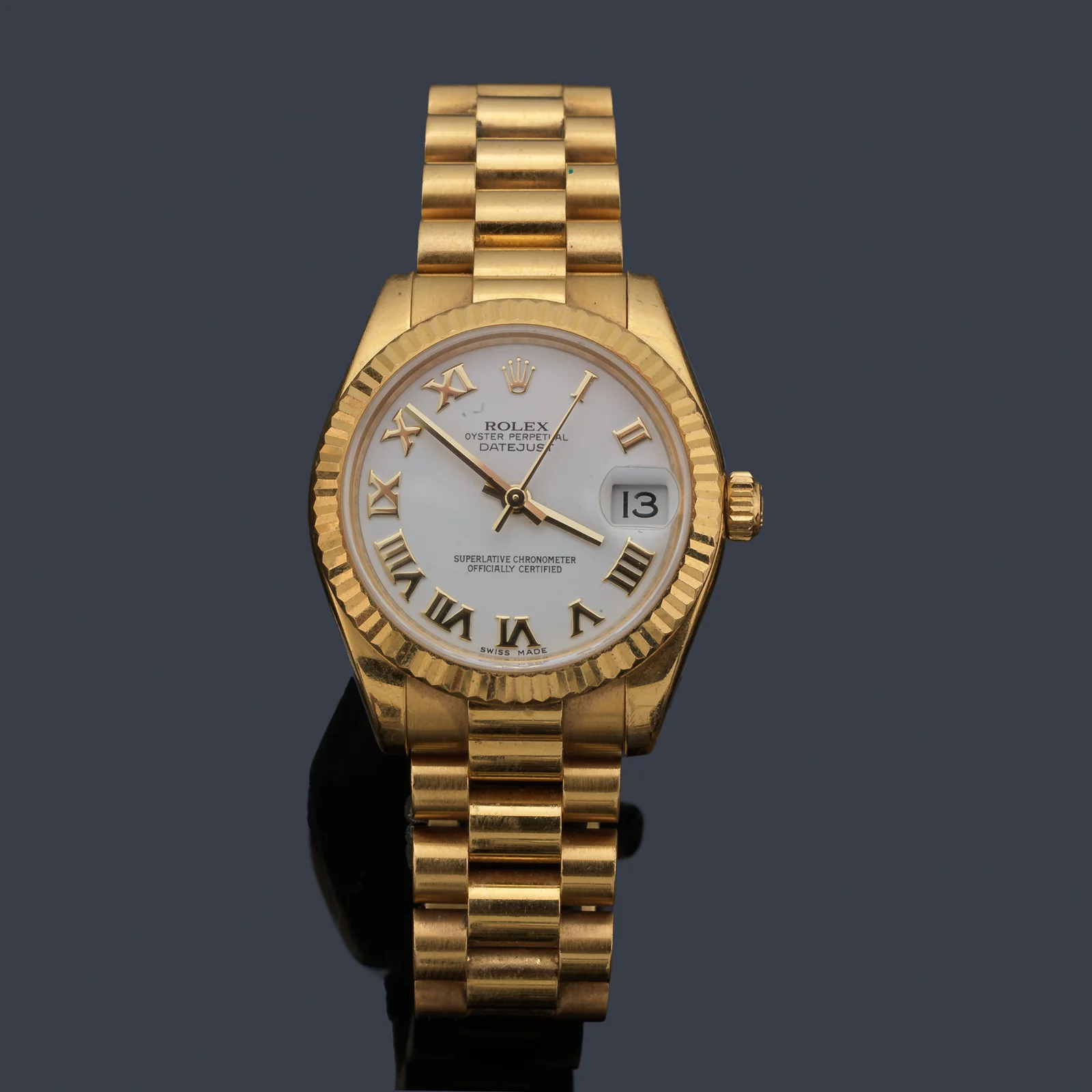 Yellow-gold Rolex Datejust 31 ref. 178278 with a white Roman-numeral dial and Jubilee bracelet.