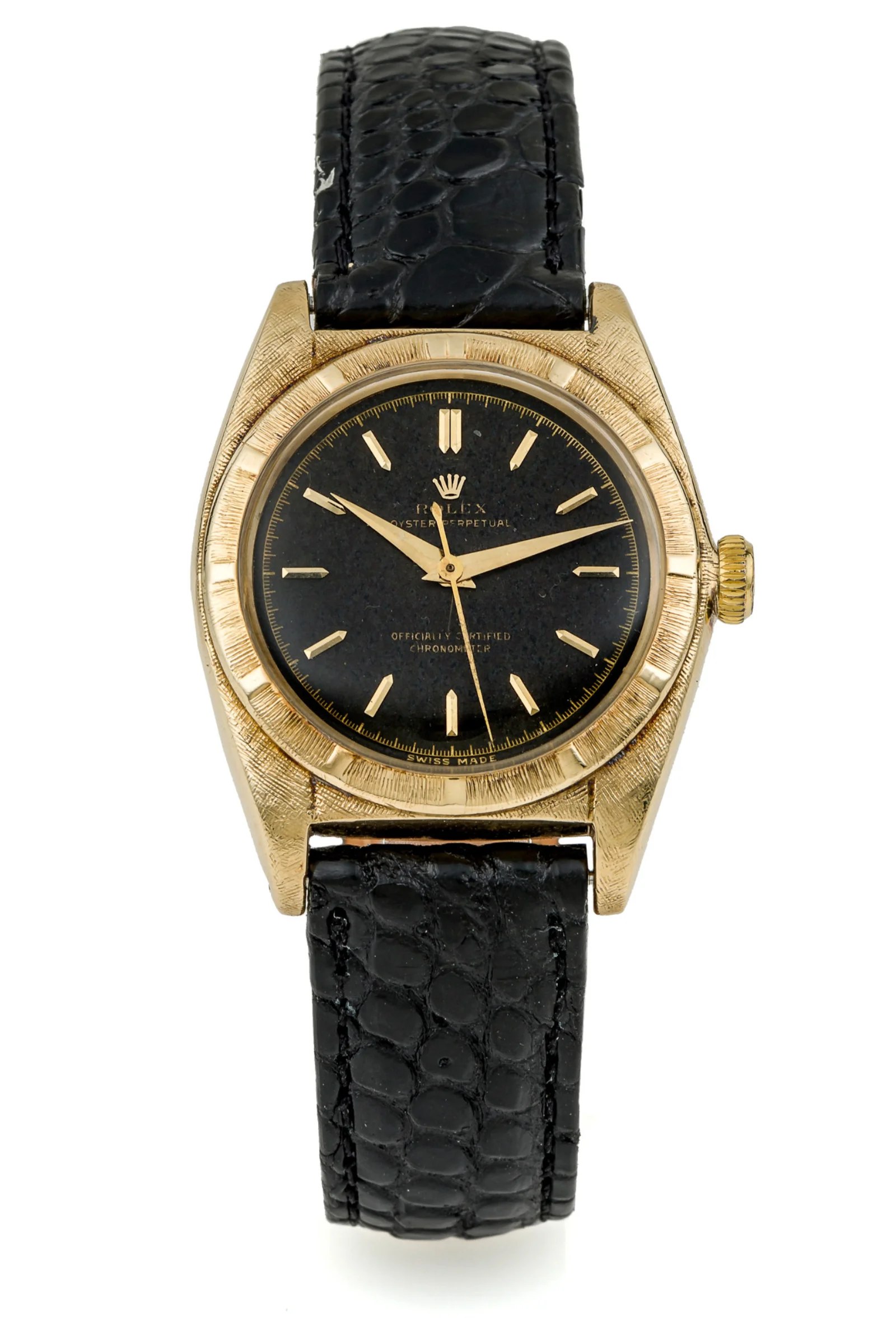 18K yellow-gold Rolex Oyster Perpetual ref. 5011 with black baton dial and engine-turned bezel