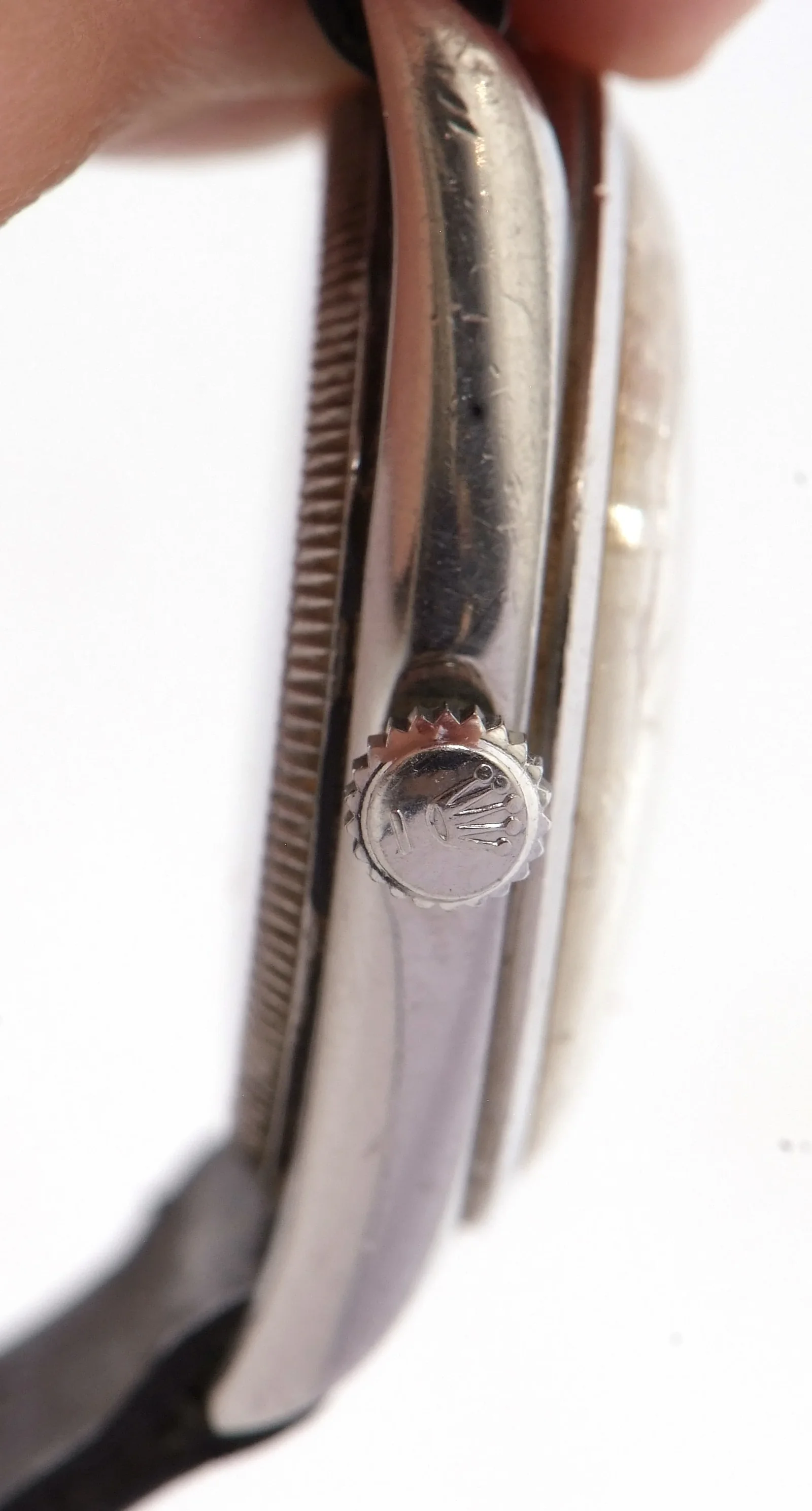 Crown and case profile on the same Keys Fine Art watch.