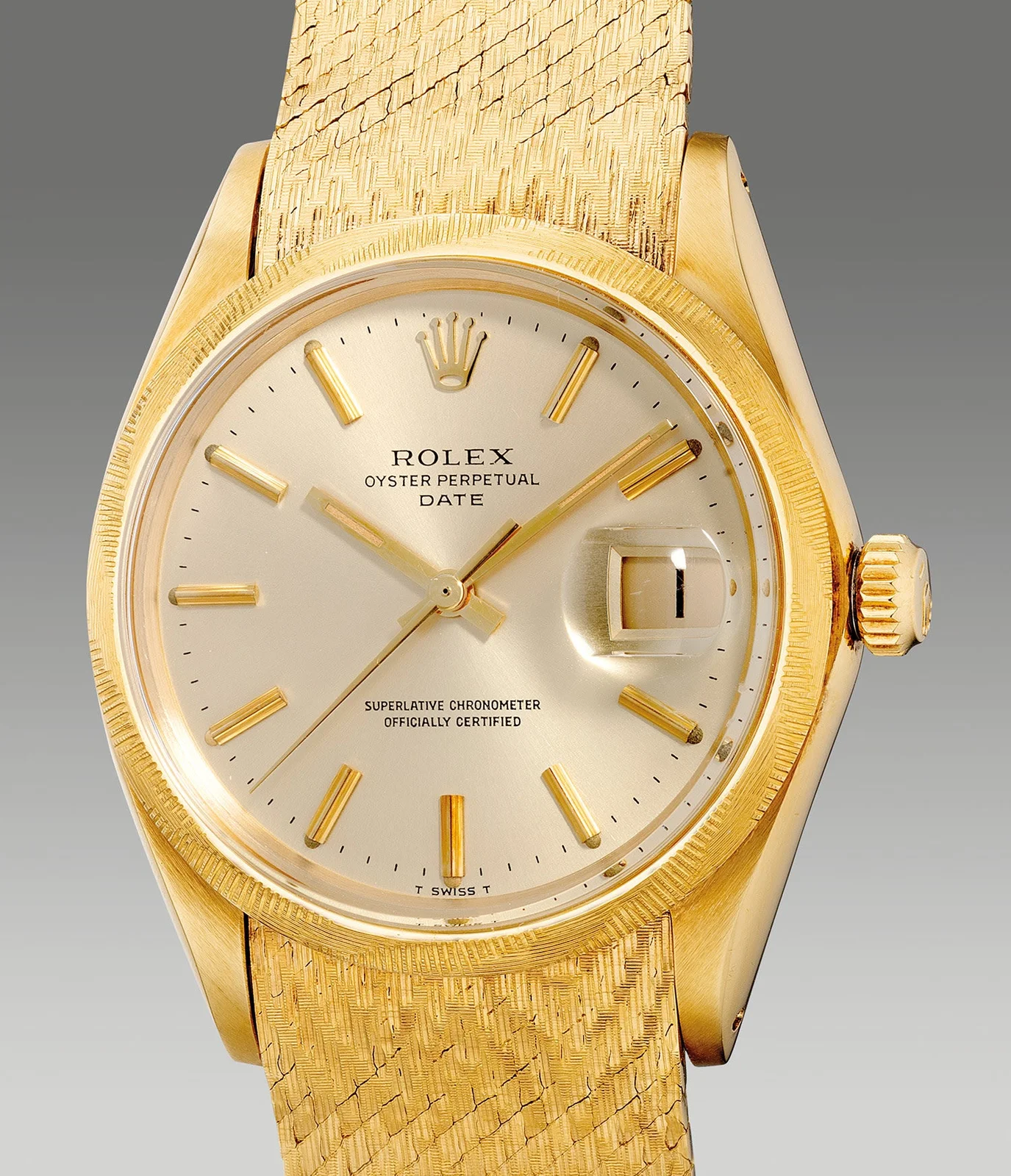 Champagne dial, patterned bezel and gold mesh bracelet on Rolex ref. 1513