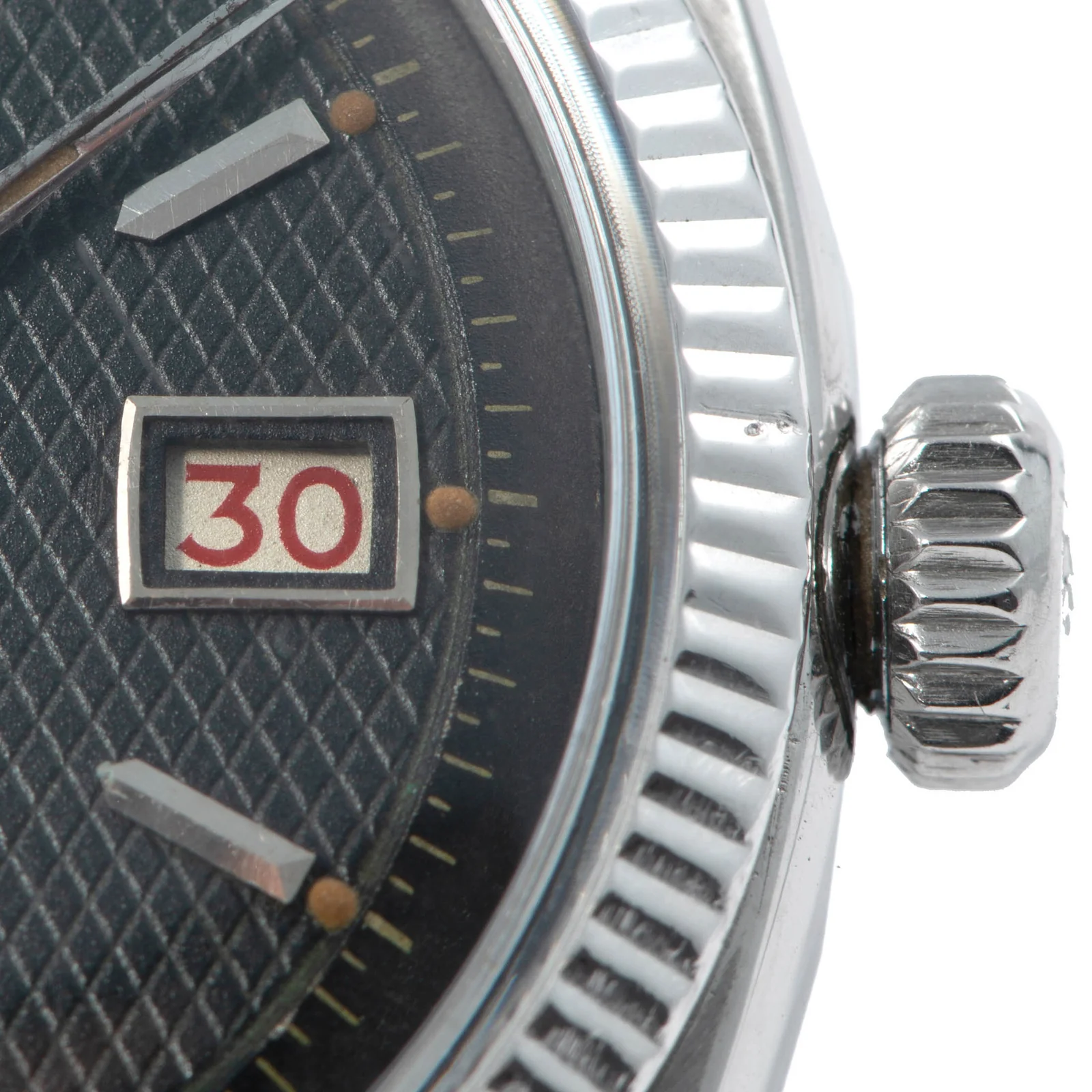 Crown and bezel on the steel 6305/1 catalogued by Antiquorum