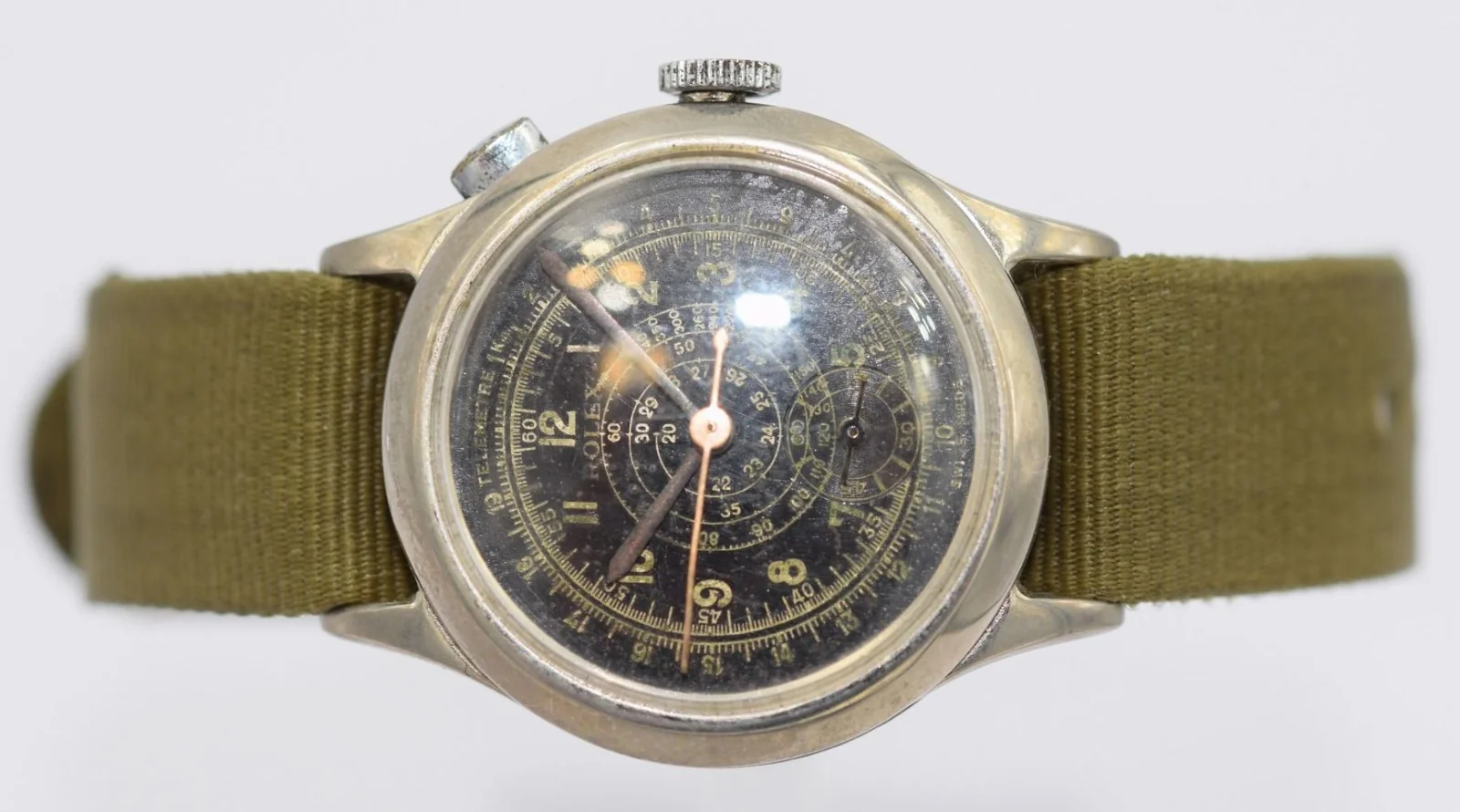 Worn black multi-scale dial on a Rolex Marconi watch