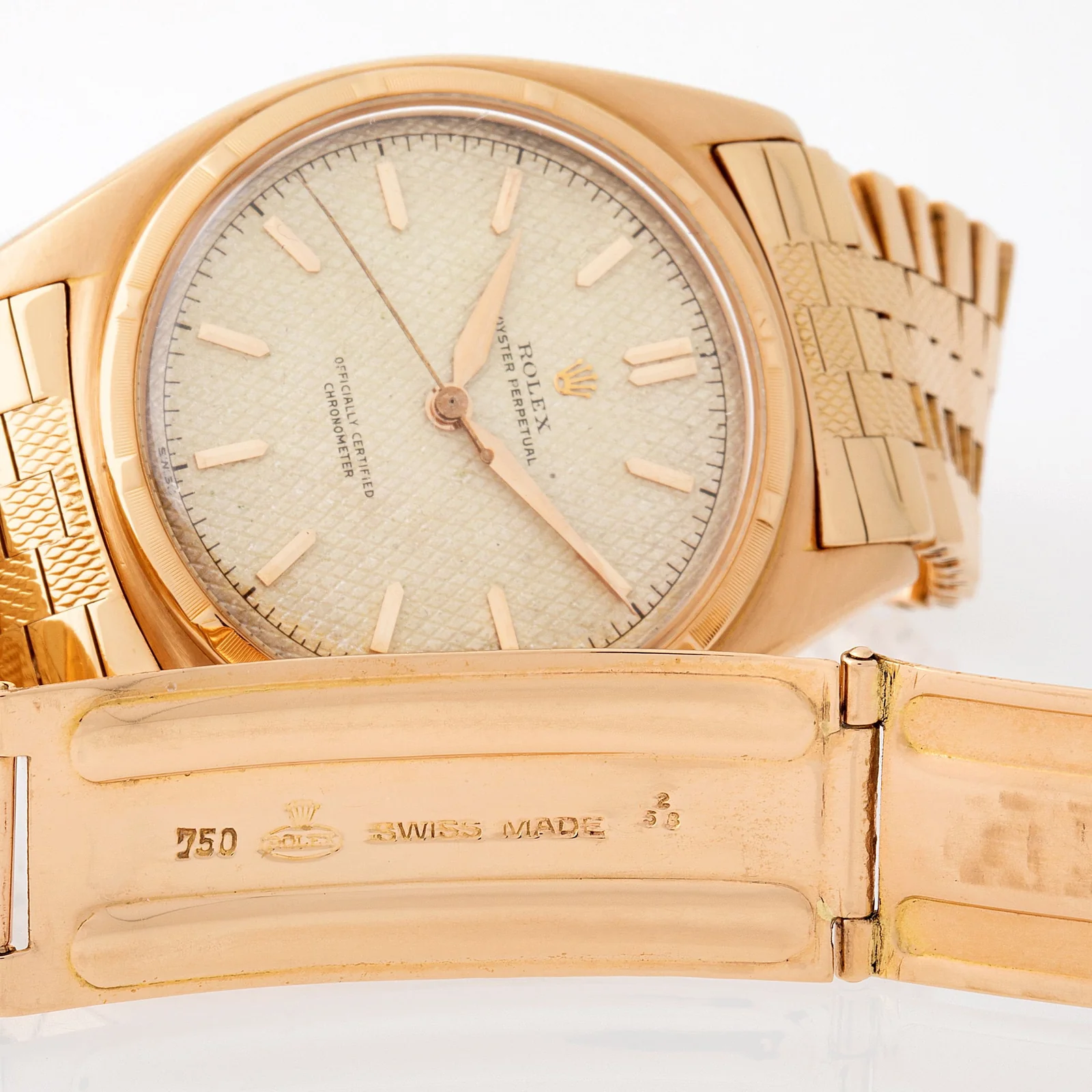 Interior of the opened pink-gold bracelet clasp on Rolex reference 6029 case 706020