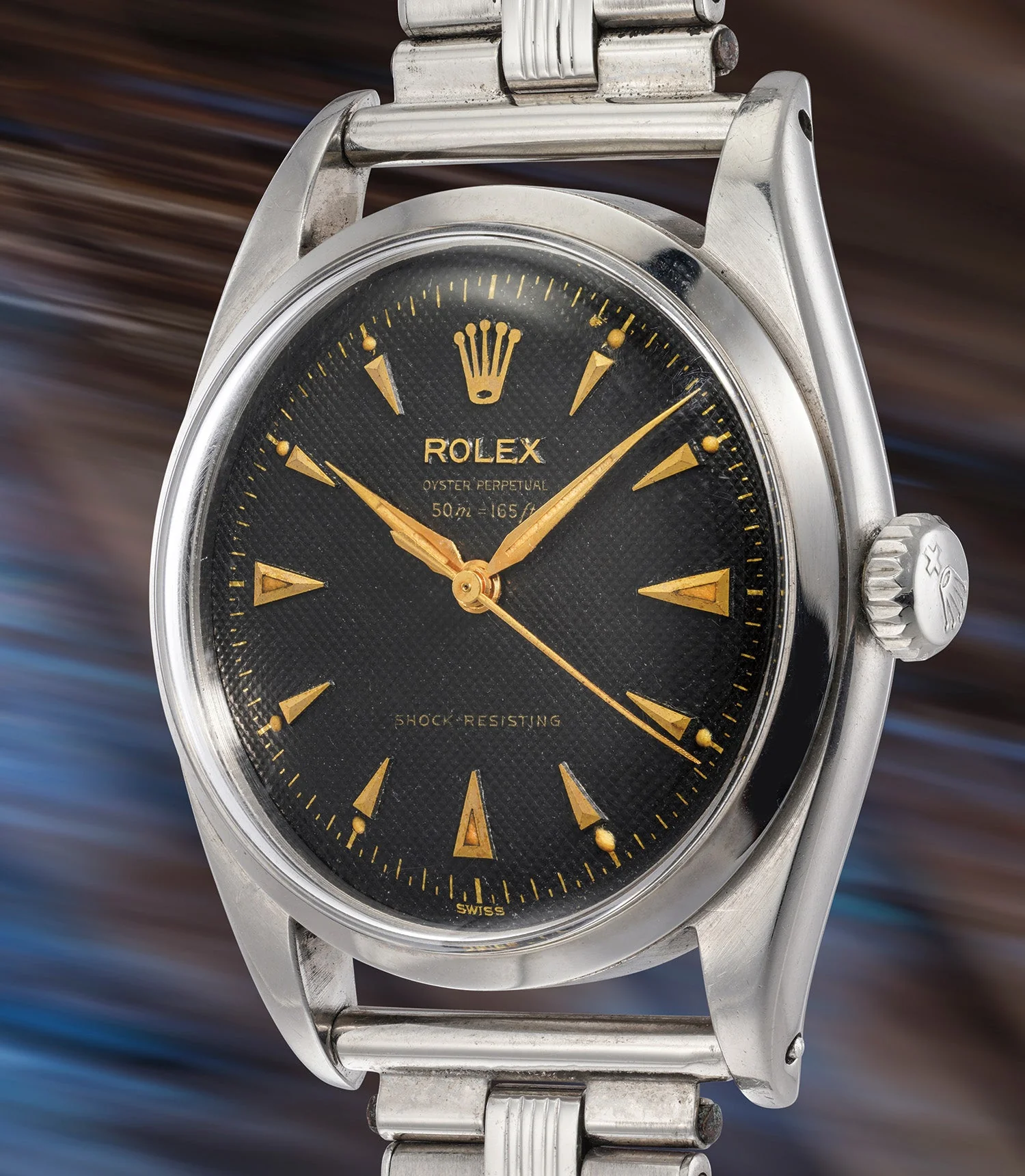 Steel Rolex Oyster Perpetual ref. 6352, case 28,524, with black honeycomb dial