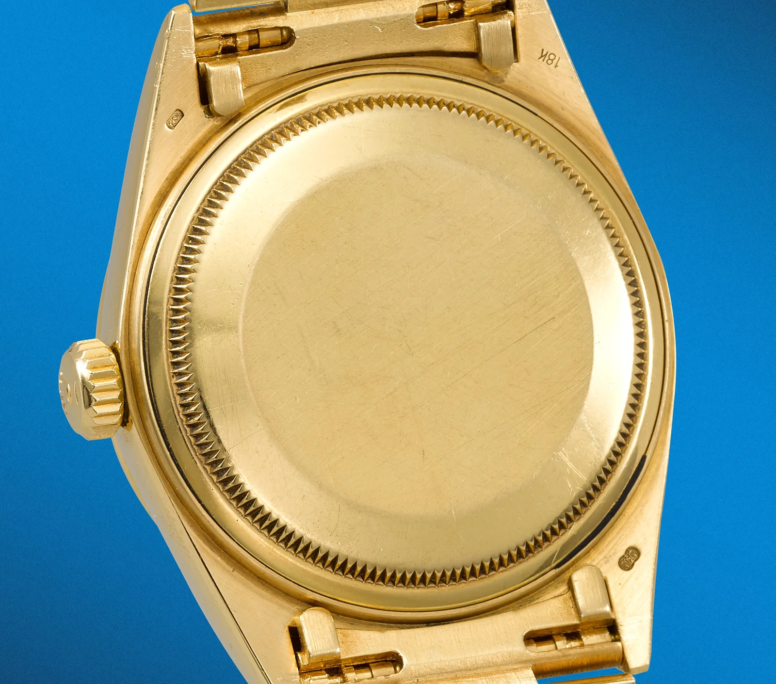 Yellow-gold caseback and case hallmarks of a Rolex Day-Date 18018, case R594158
