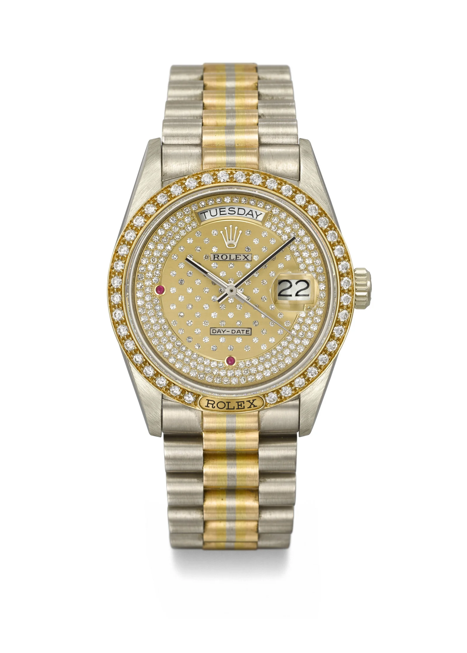 Rolex Day-Date 18129 with pavé diamond dial, ruby accents, and three-colour President bracelet