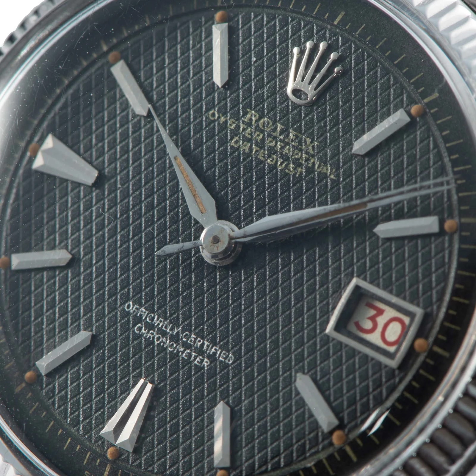 Dial texture and date window from the same Antiquorum watch